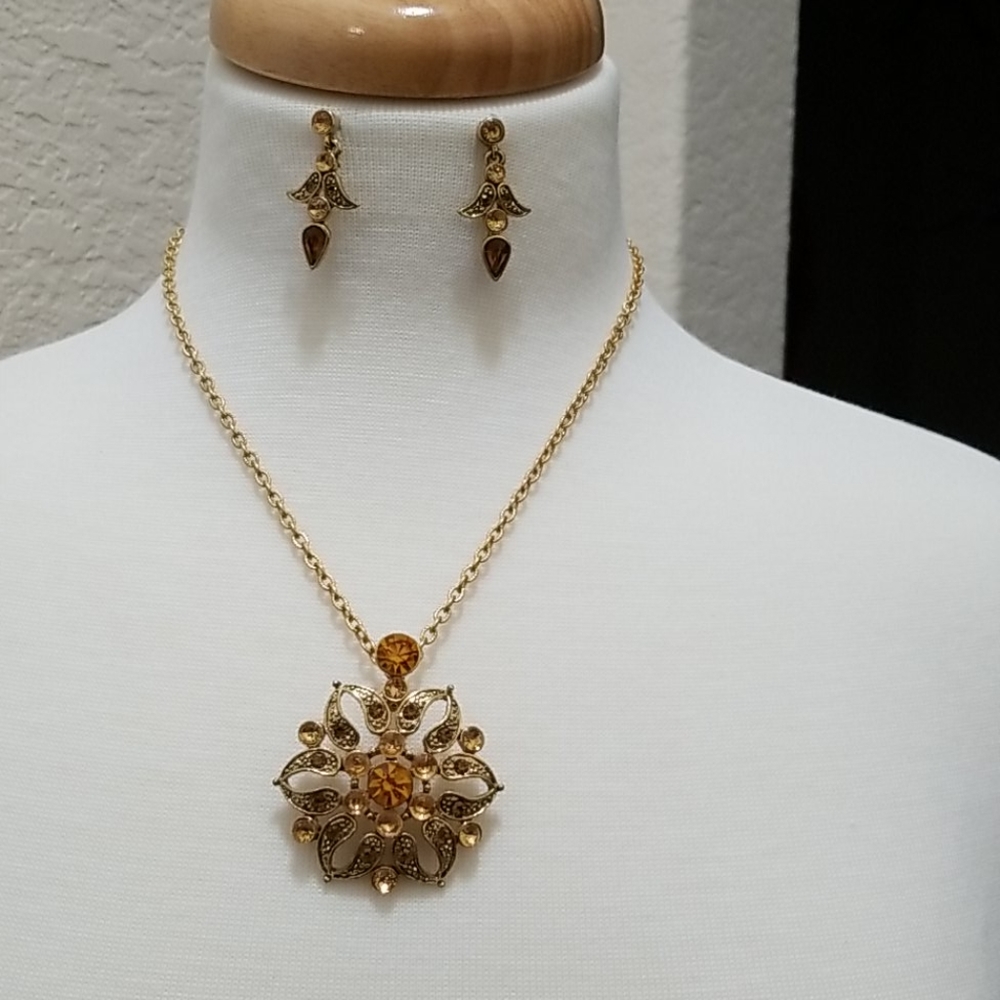 Yellow crystal and gold necklace and earrings